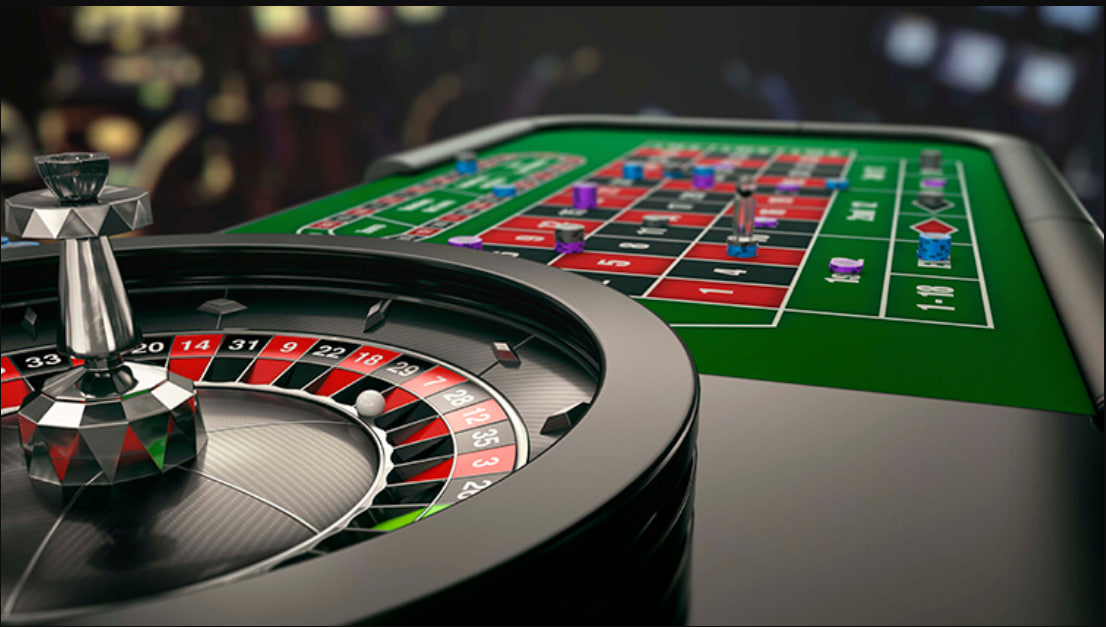 A player's hand holding a smartphone, displaying a winning spin on a crypto slot game